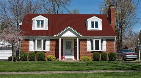 red brick house with charcoal metal roof|metal roof on brick ranch.